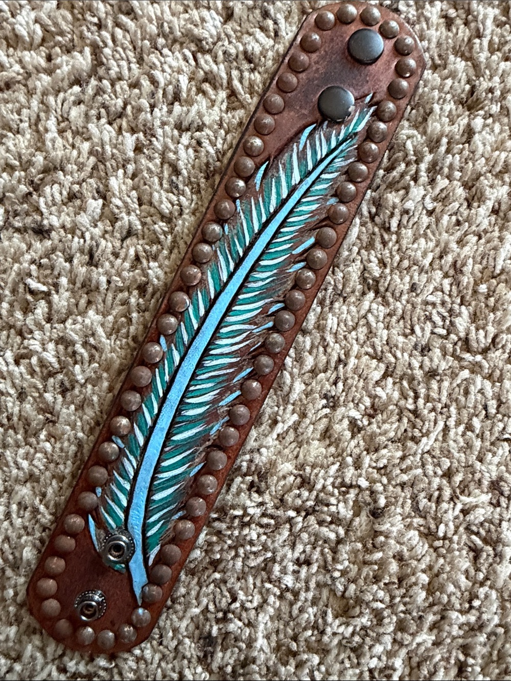 Brown Leather Bracelet with Teal Feather Accent